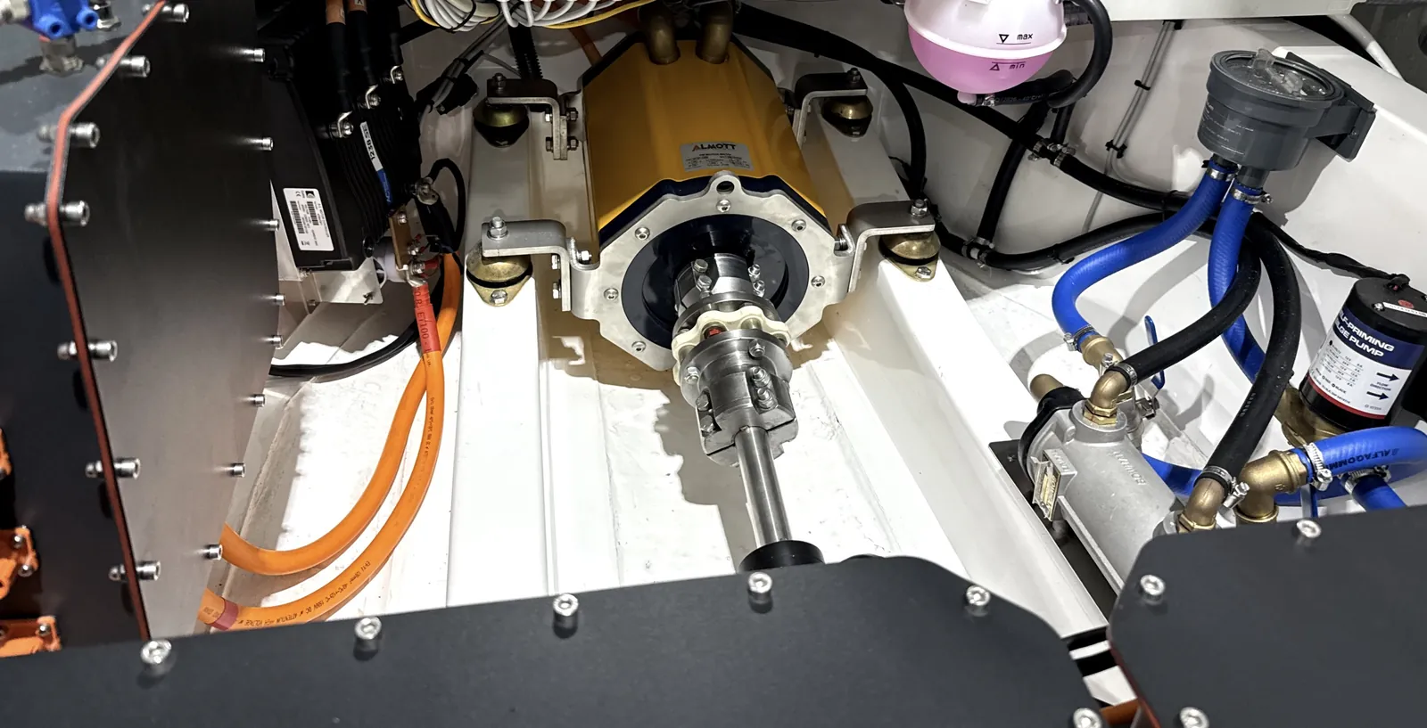 The 50 kW ALMOTT motor and its controller in the engine bay of the Omega 7.2